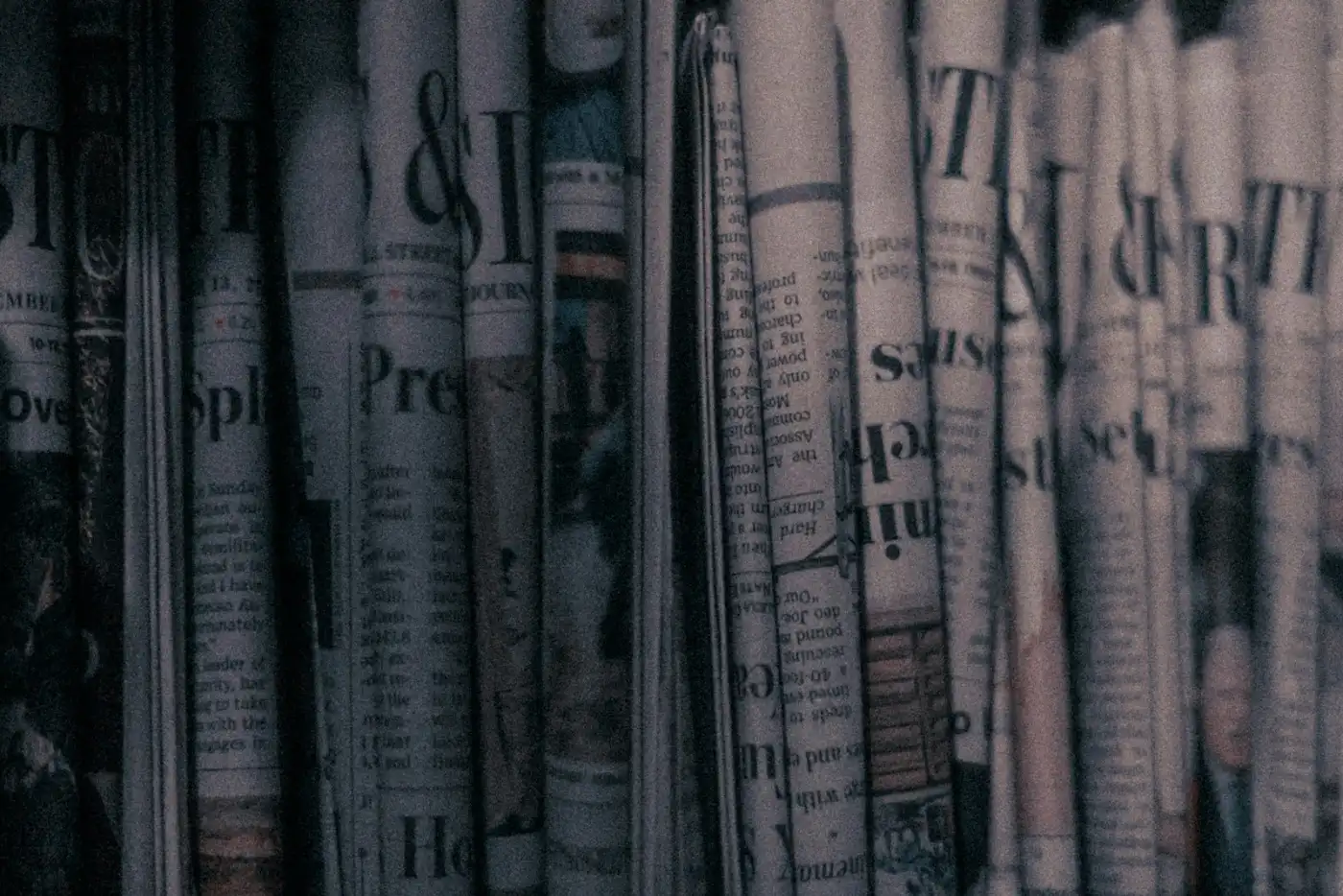 Rolled newspaper reading Breaking News, representing the latest CRS & Immigration Updates