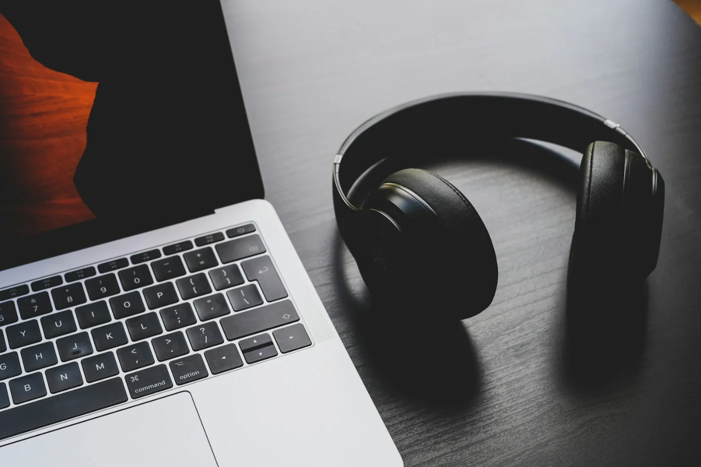 Person wearing headphones, representing the listening portion of the CLB Calculator language test