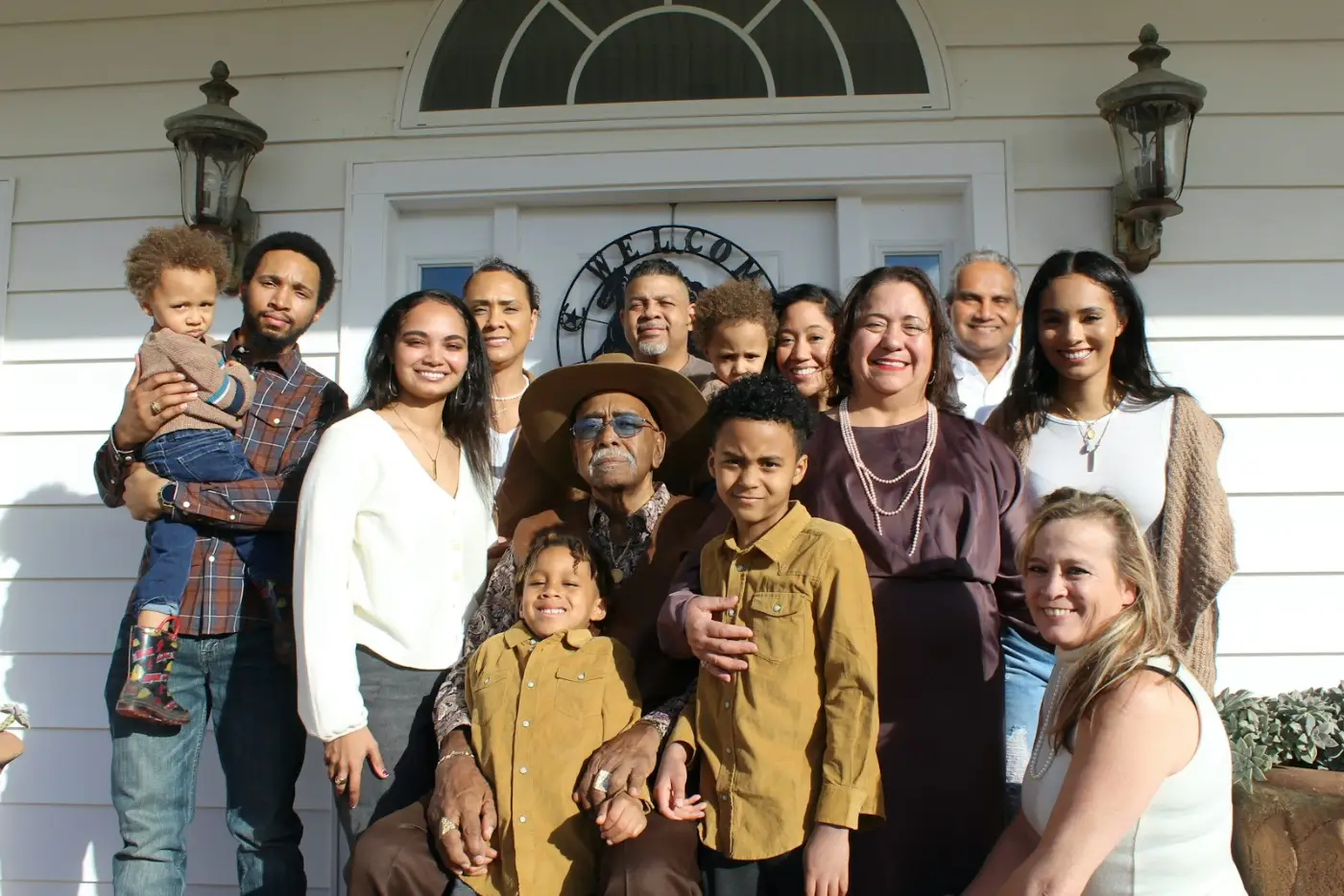 Multiple generations of a family together outdoors, made possible by the Canada Super Visa