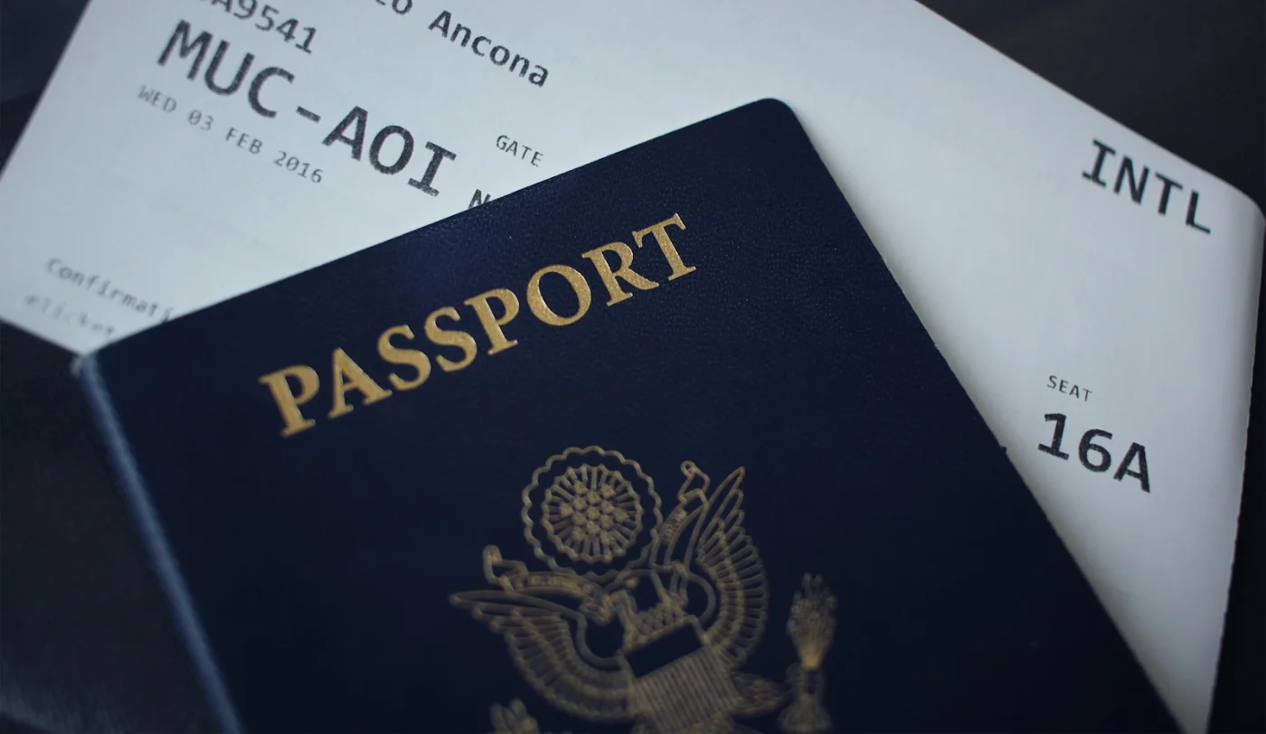 Passport pages filled with stamps, a reminder that travel history matters when working out how to get Canadian citizenship