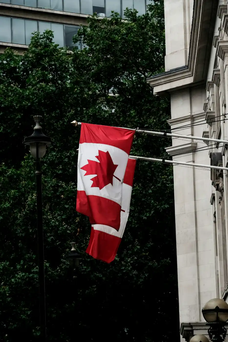 Union Jack flag flying, representing the journey of UK citizens moving to Canada