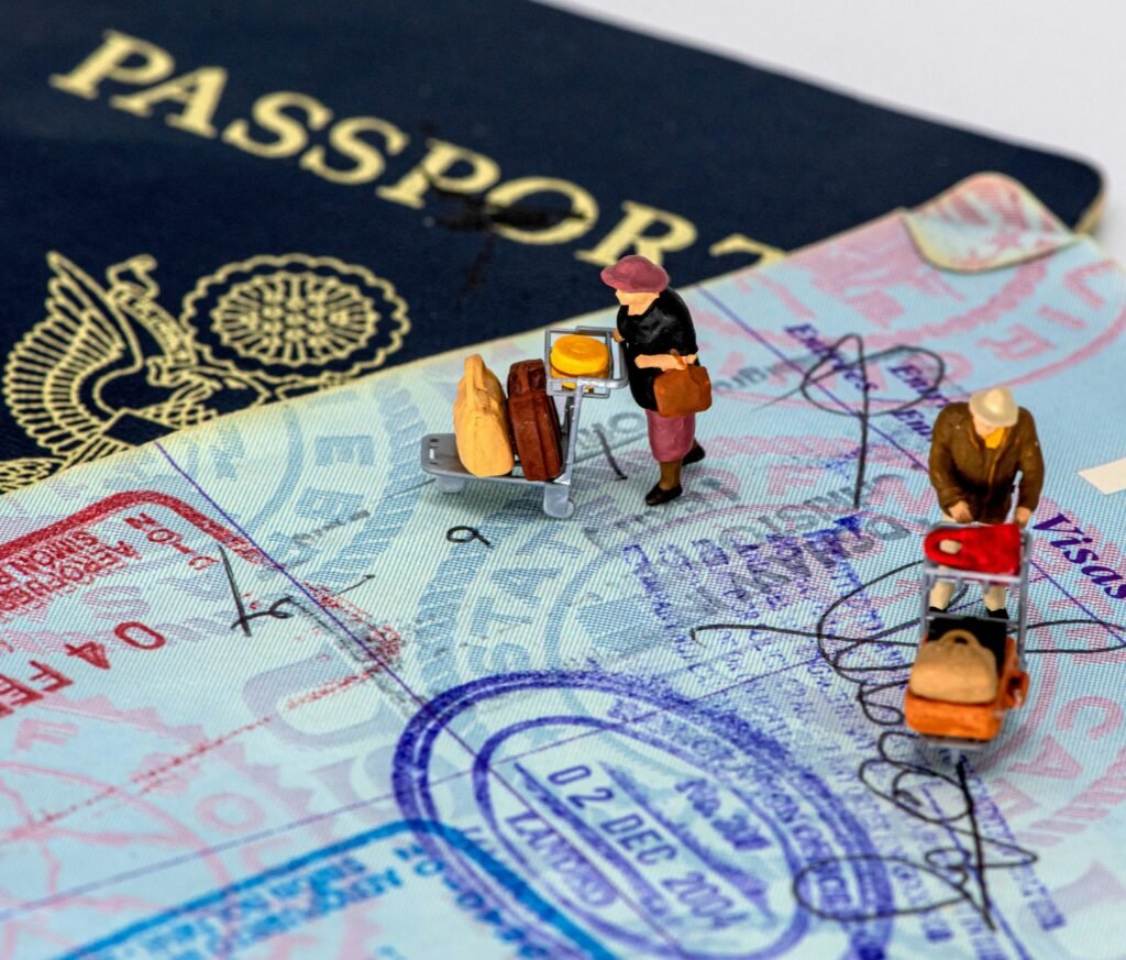 Open passport showing visa and entry stamps after completing the Express Entry application process